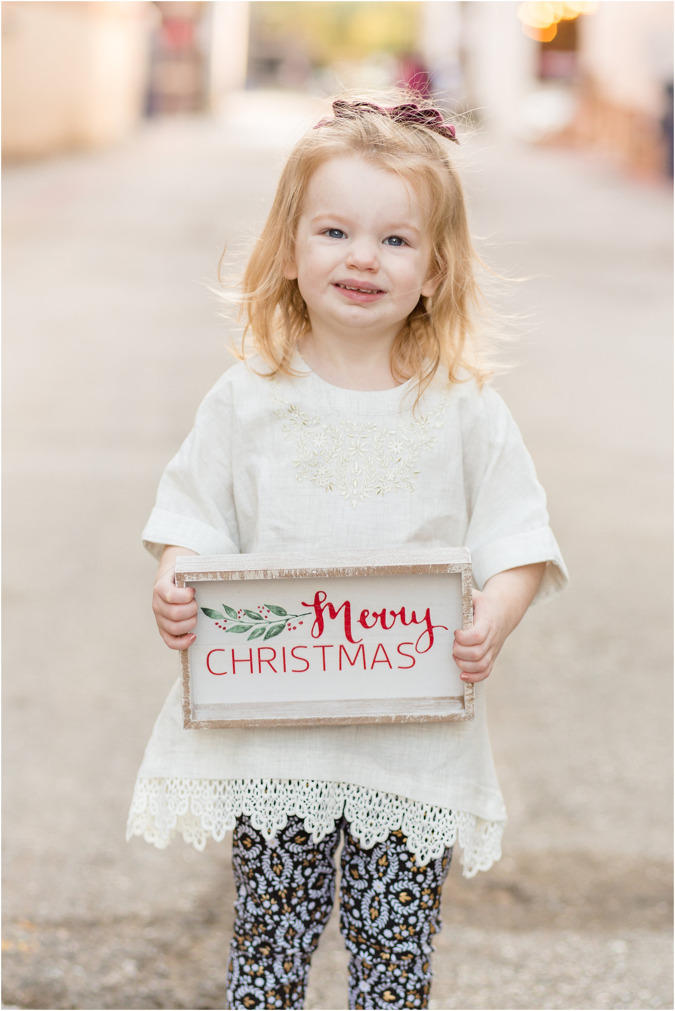 little girl christmas photo downtown mckinney