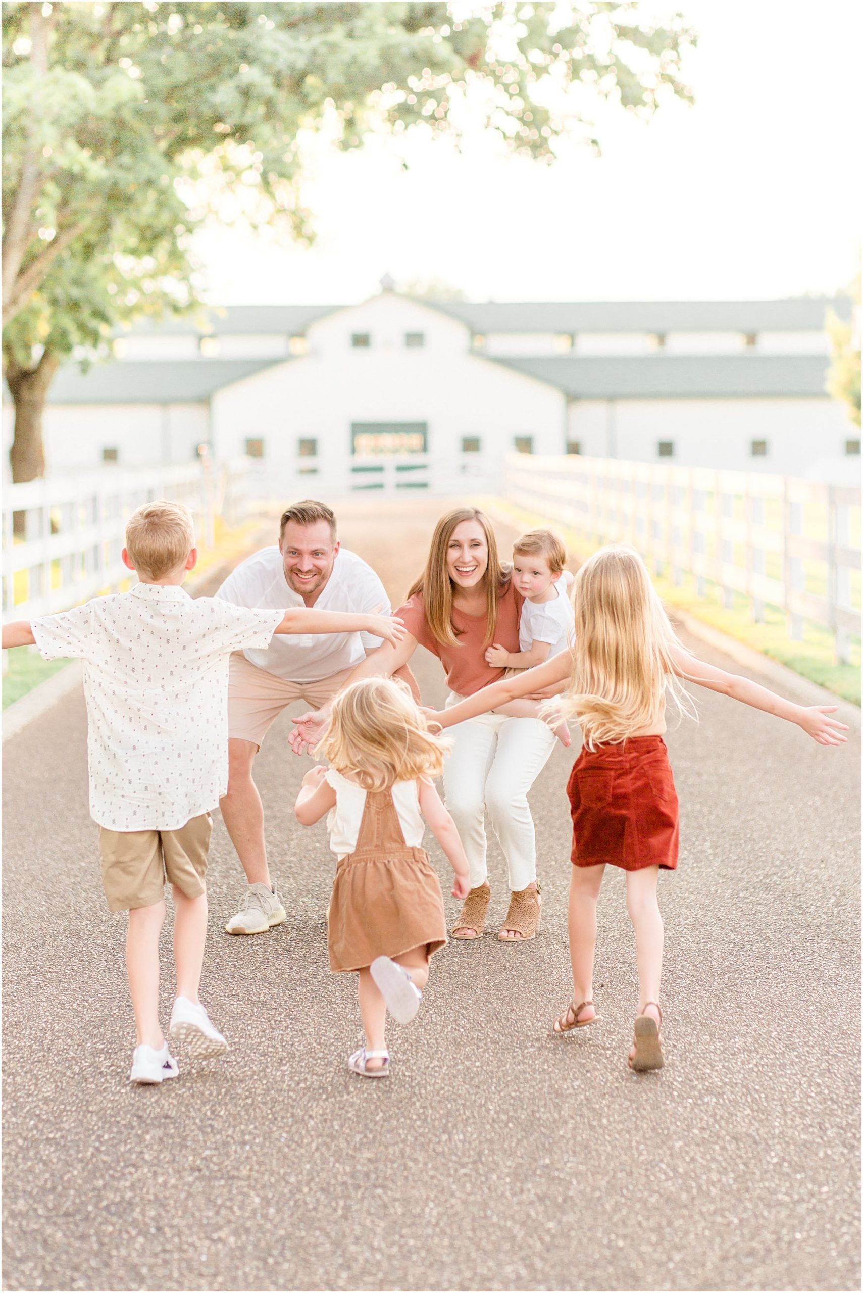 family running photo at harlinsdale farms in franklin tn by nashville family photographer