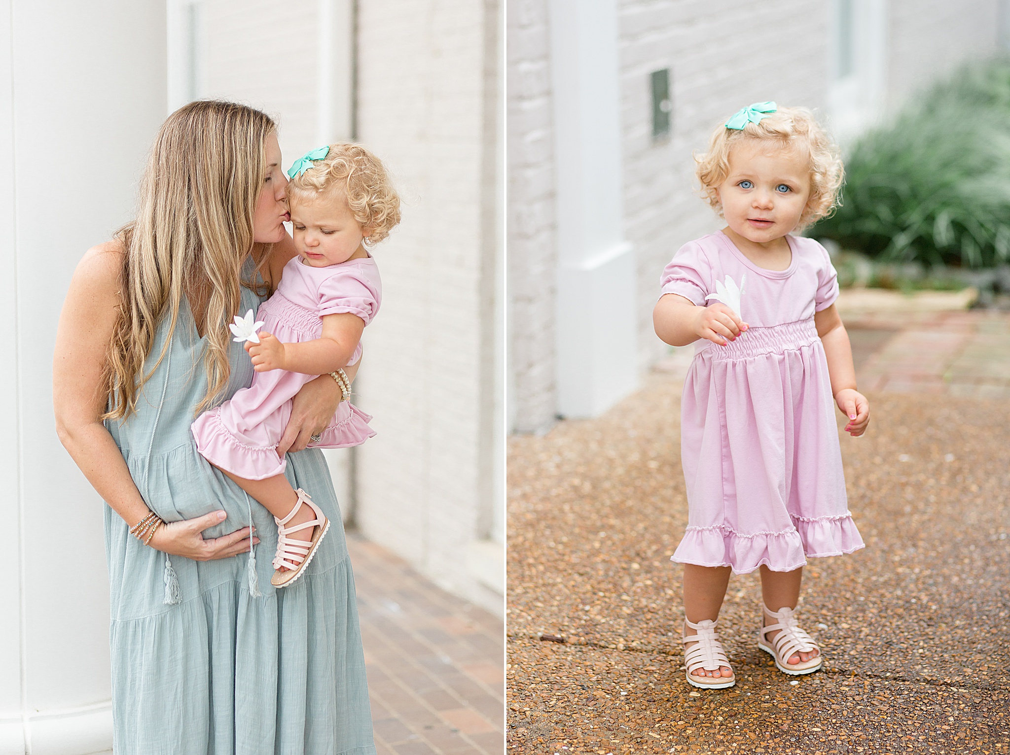 toddler with flower poses with mom during family session in Franklin TN