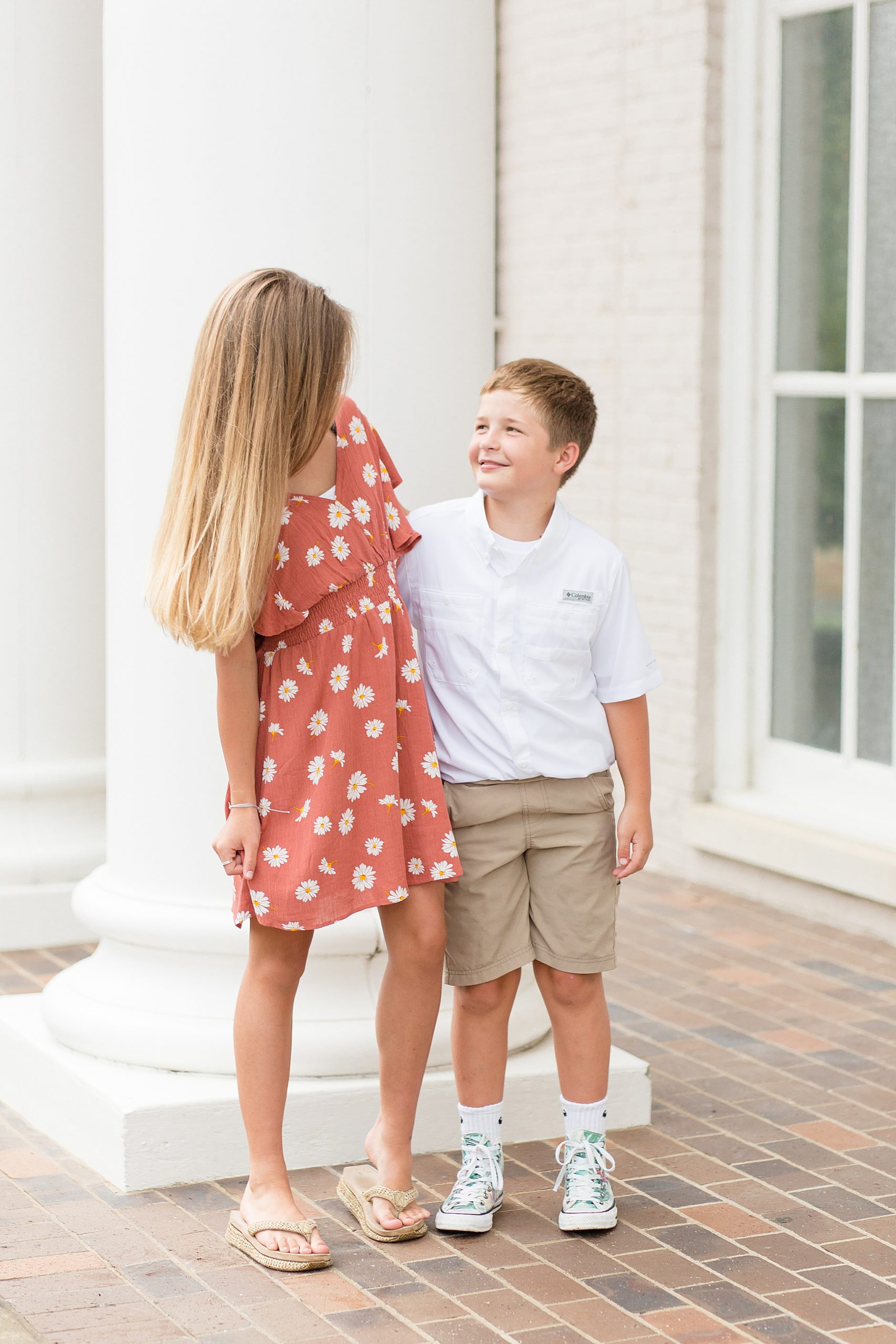 siblings pose during Franklin TN family portraits