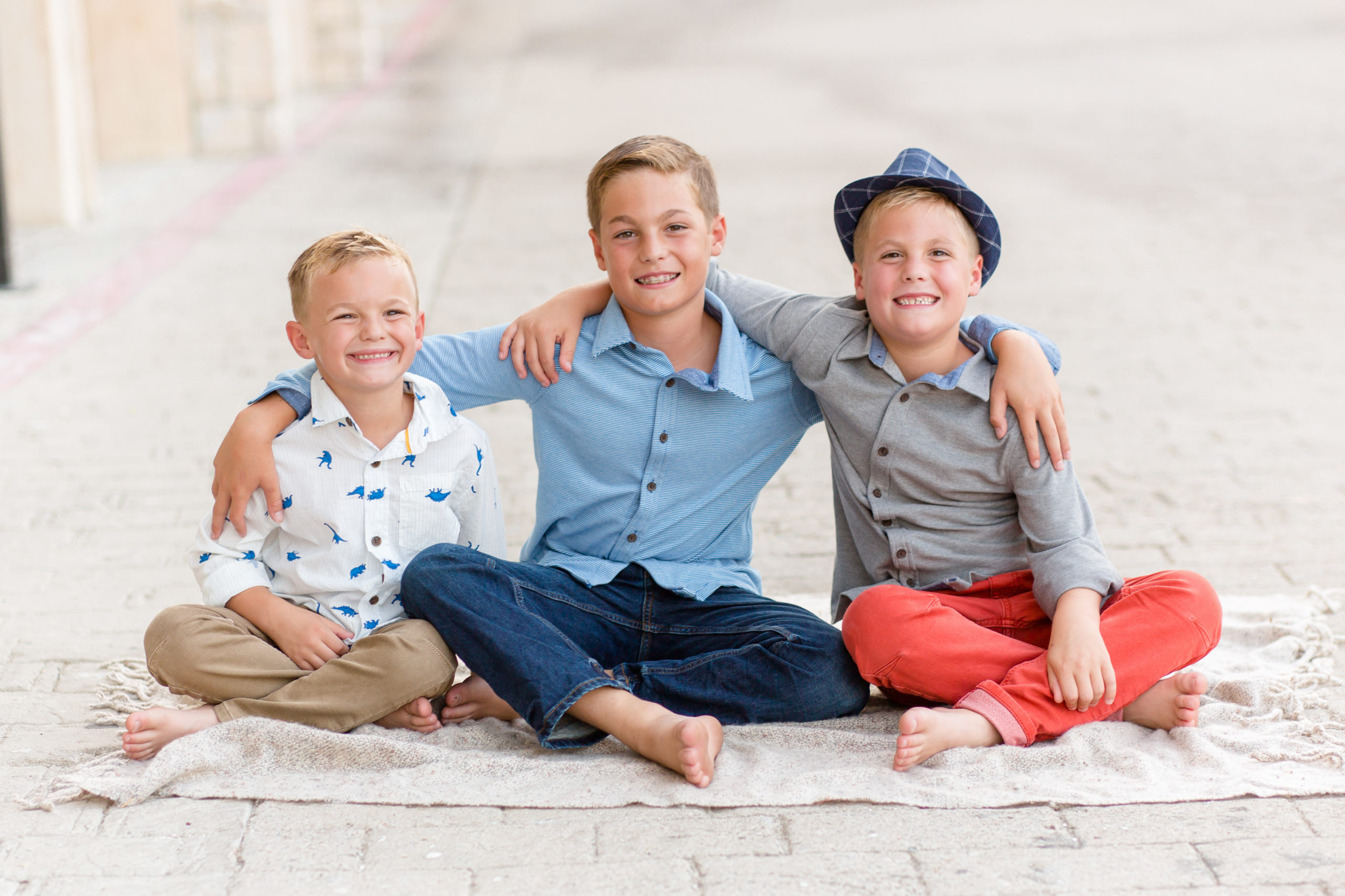3 boys brothers posing for fall mini-sessions family photos