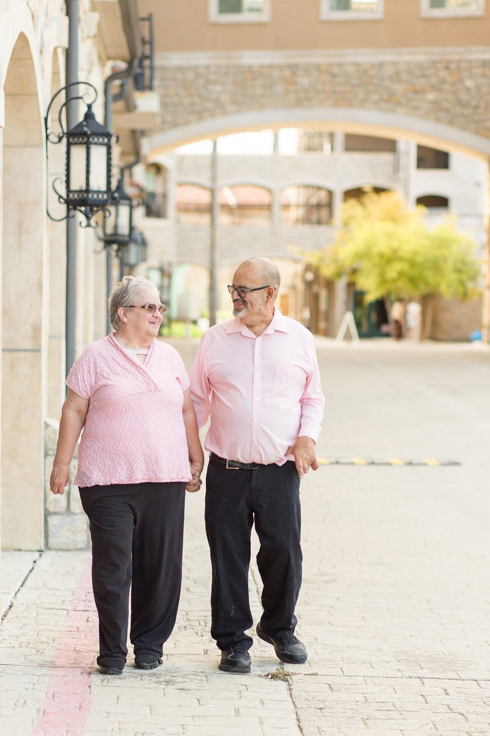 elderly couple walks through McKinney TX