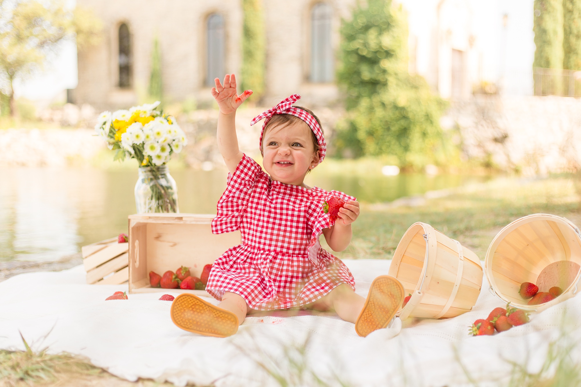 baby laughs during first birthday session in Adriatica Village