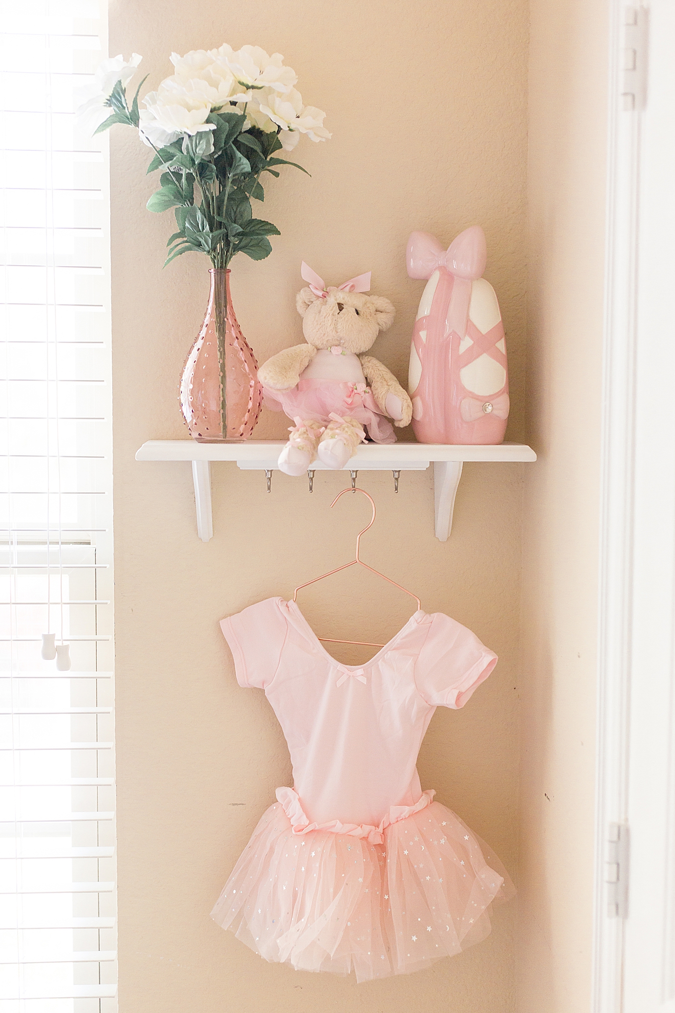 baby girl's nursery photographed during At Home Lifestyle Newborn Session
