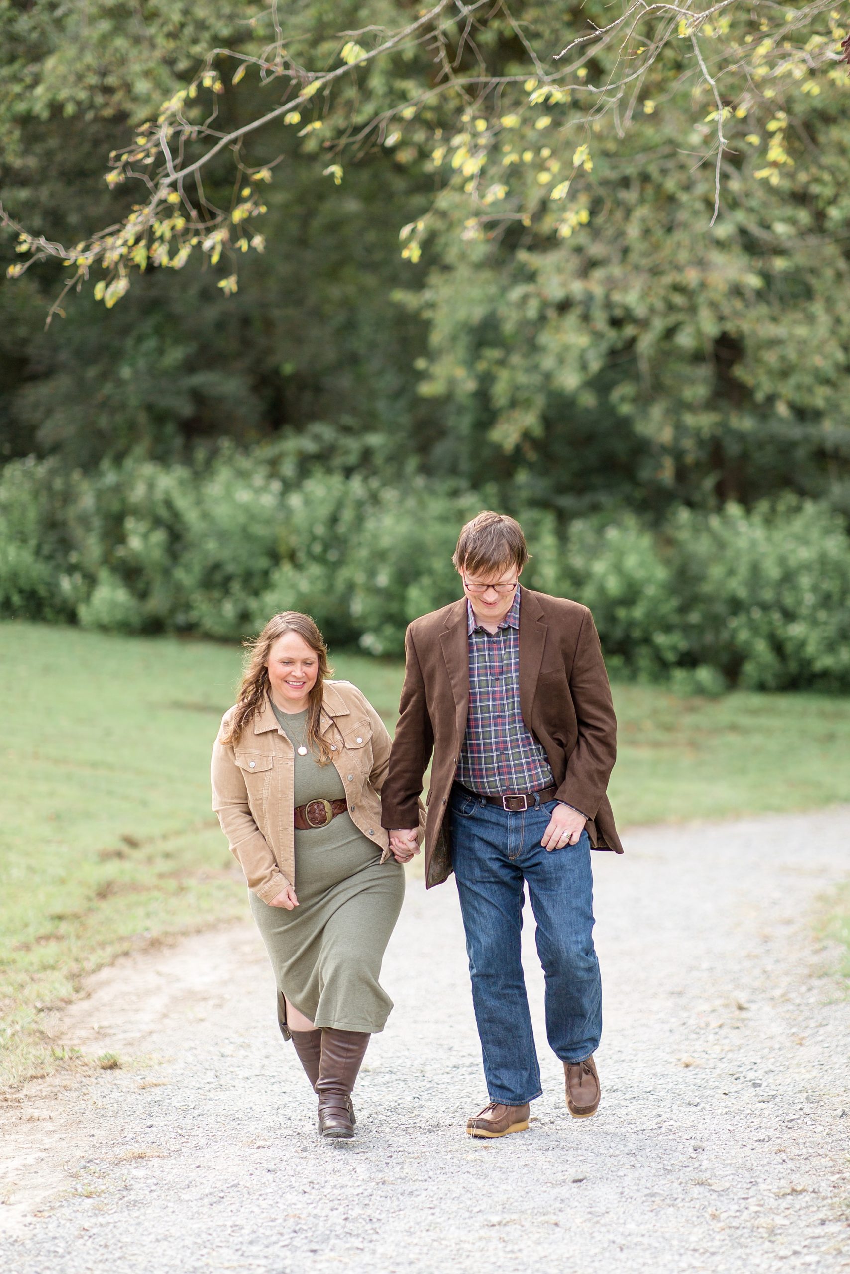 couple walks on path during Nashville TN Family Minis