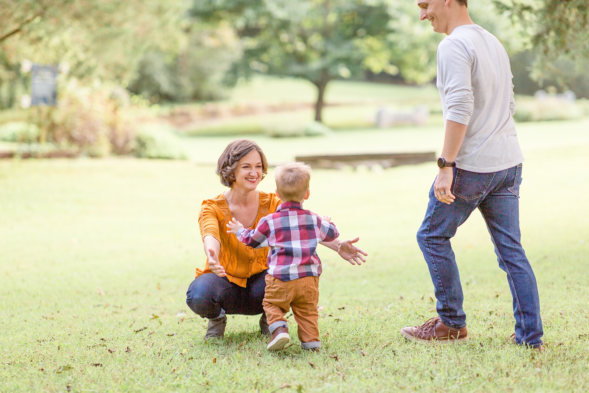 toddler runs to mom during Tennessee family portraits