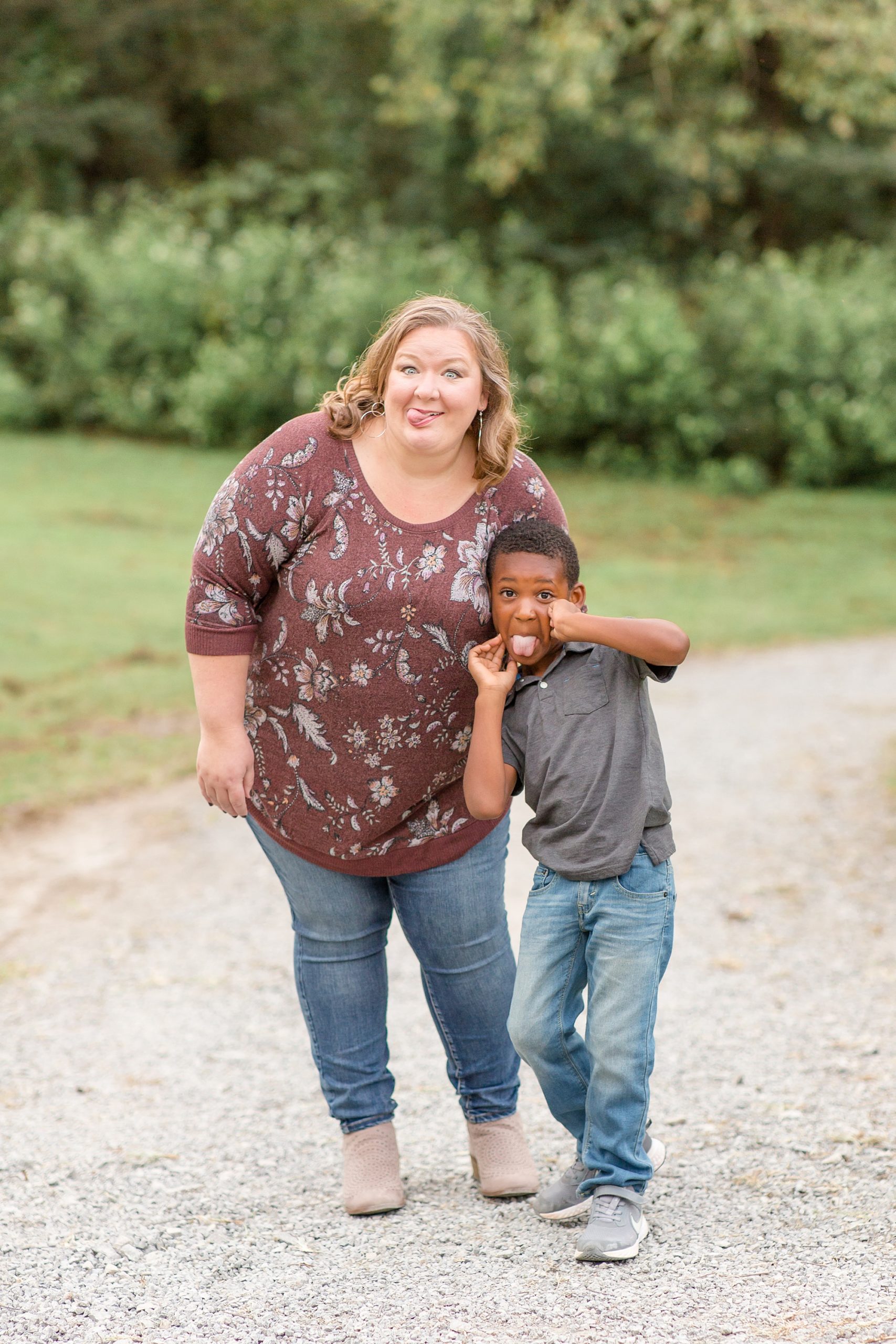 mom makes silly face with son during TN family photos
