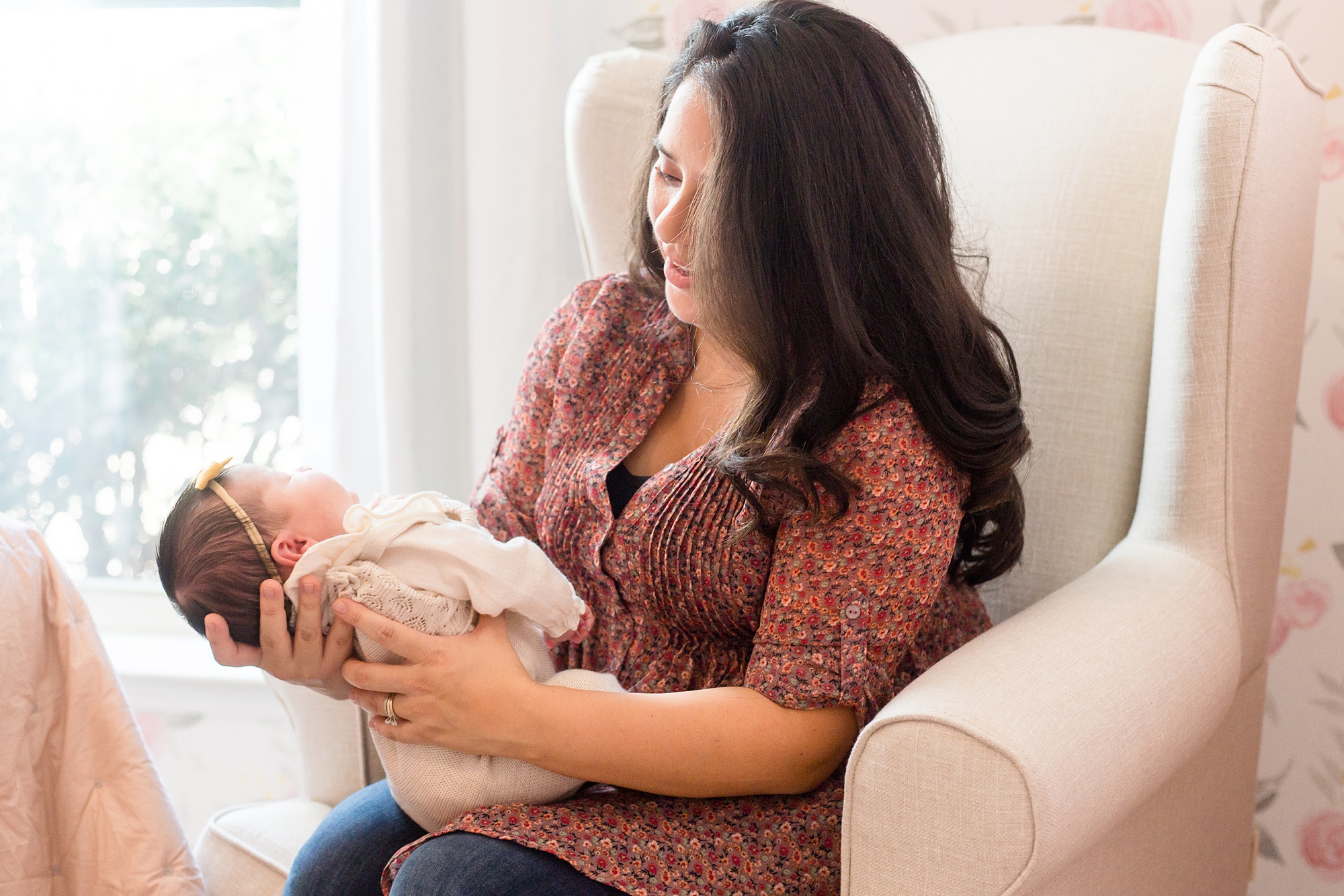 mom looks at baby during Texas lifestyle newborn session