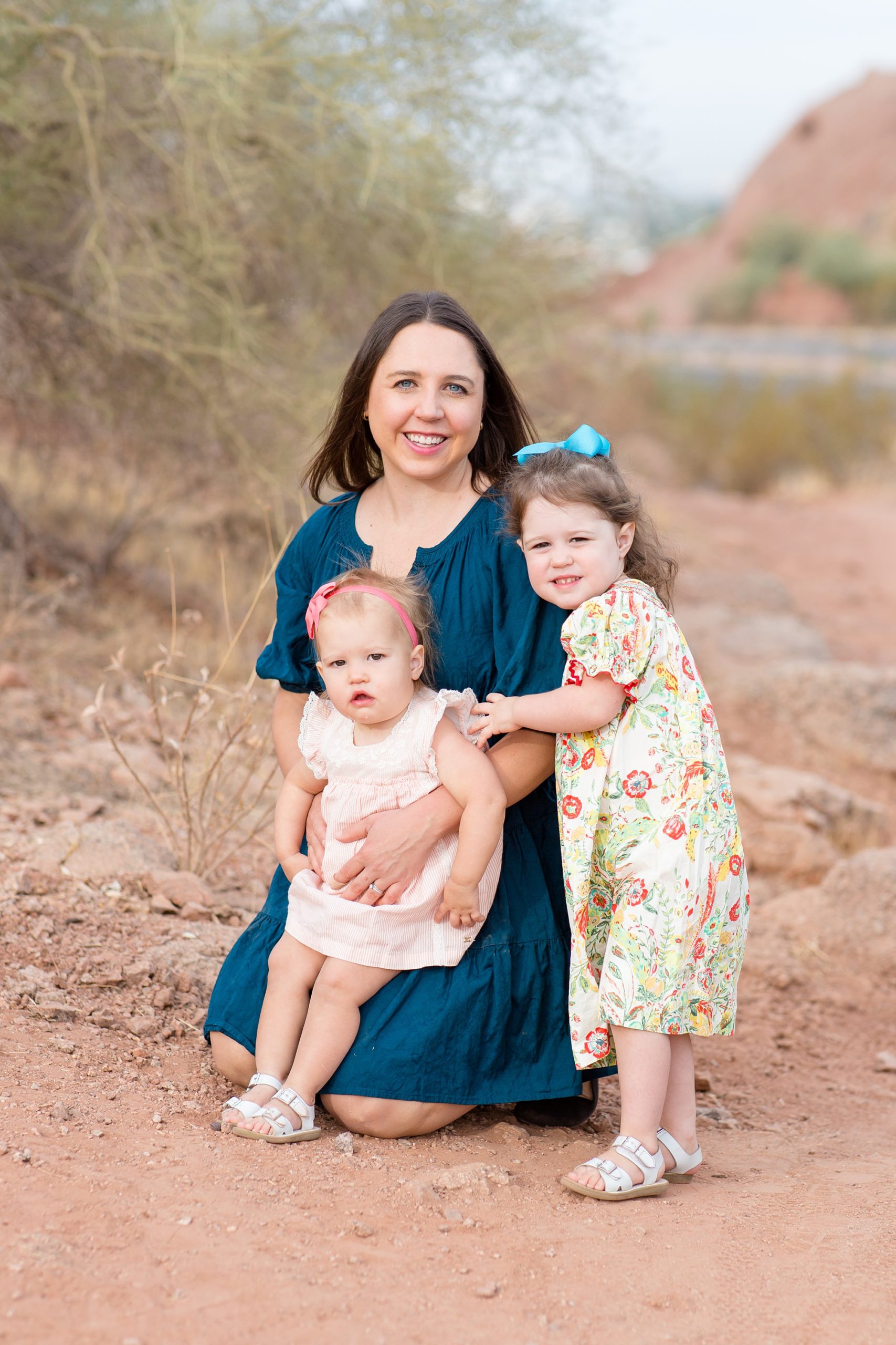 mom poses with daughters in Phoenix AZ