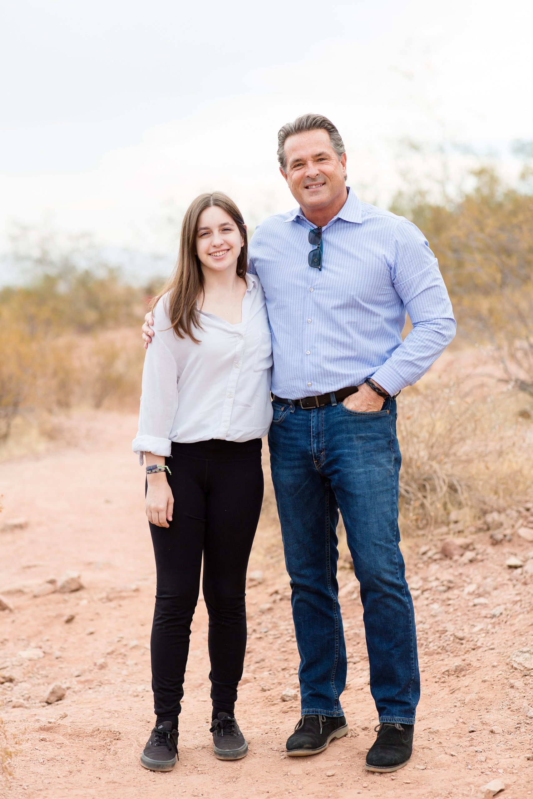 dad and daughter pose together during family photos