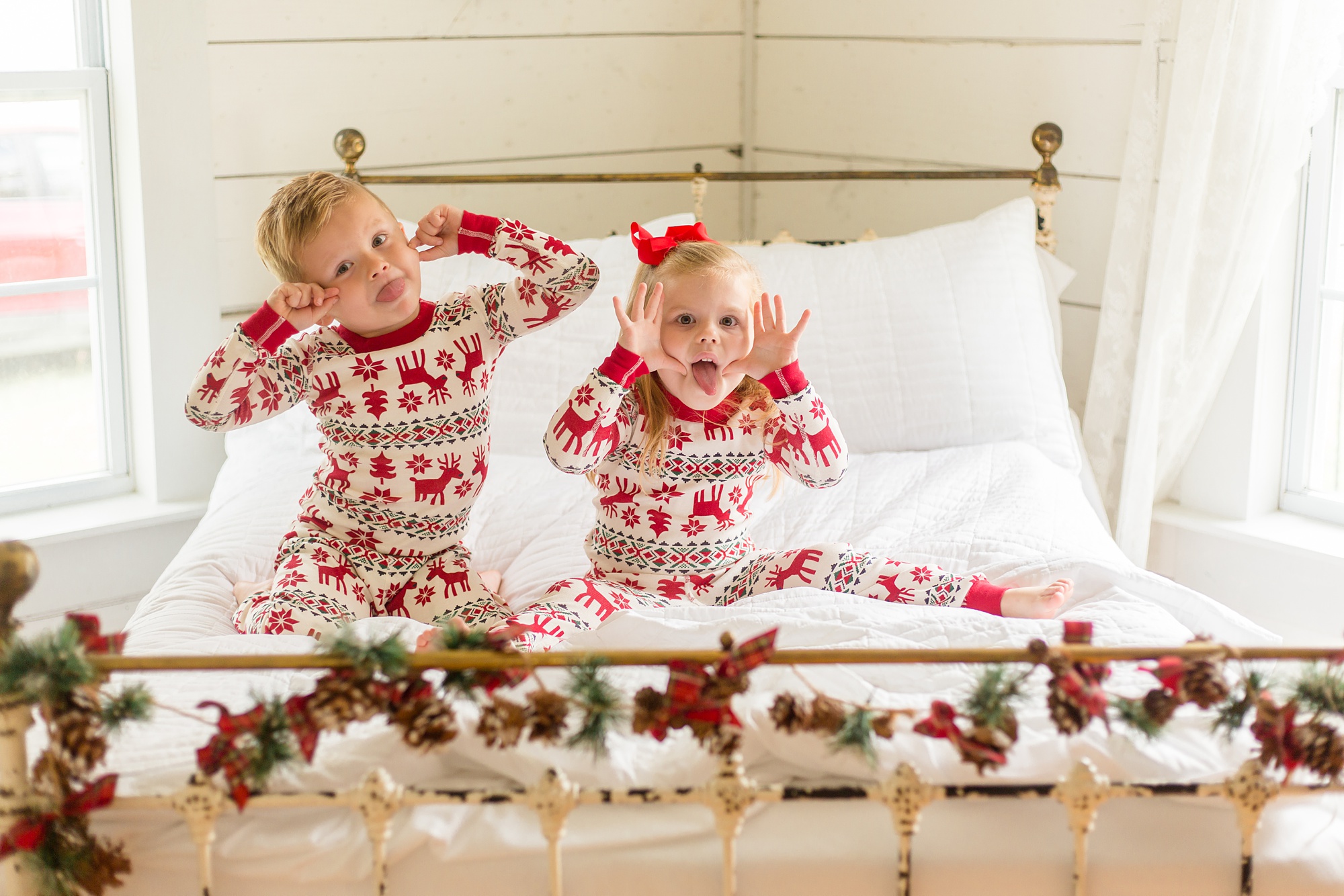 kids make faces in matching PJs during Studio House Christmas Minis