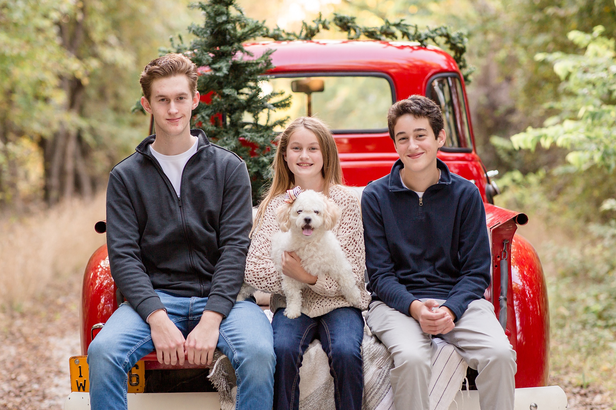 siblings sit with dog during McKinney TX mini sessions