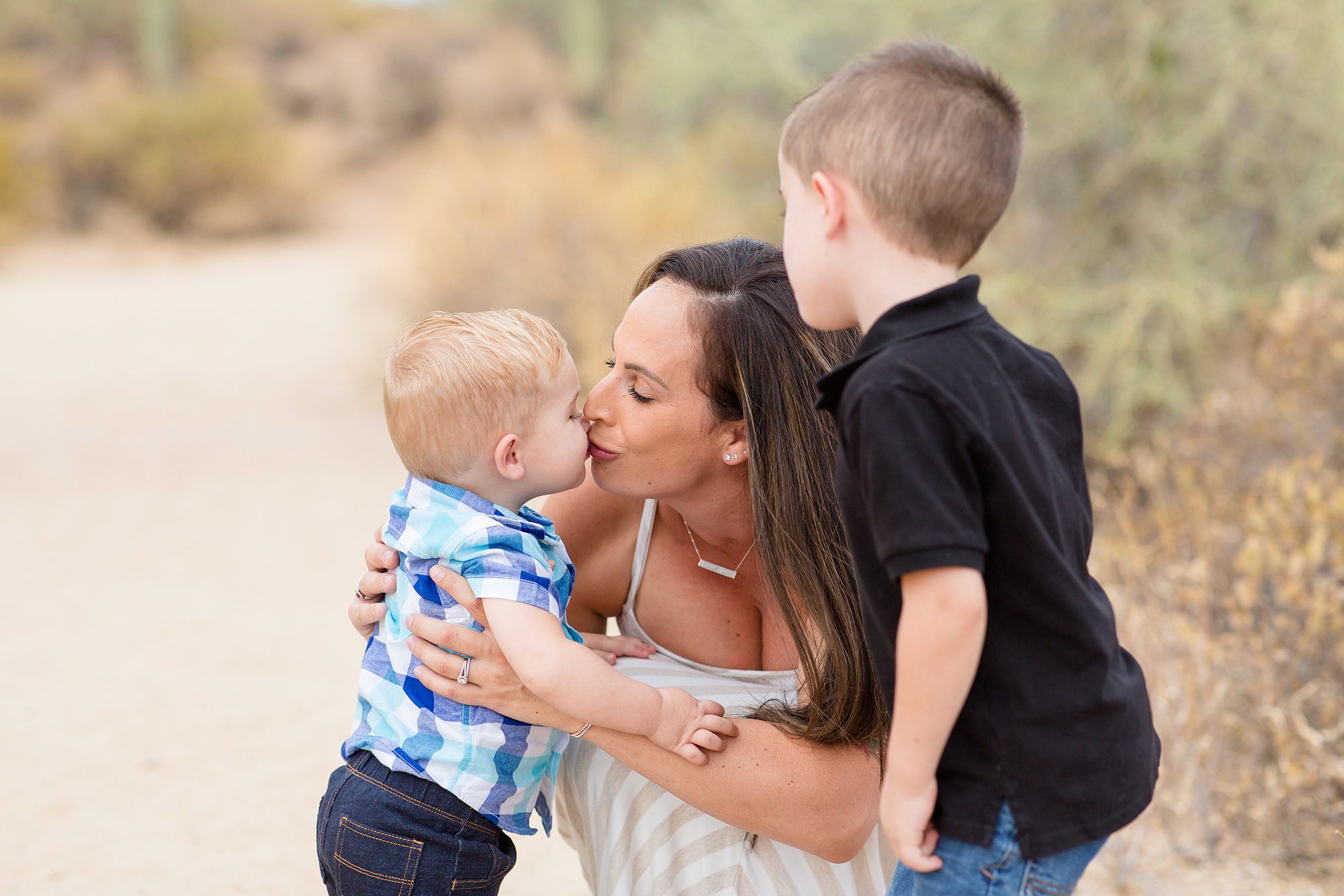 Usery Park family portraits with toddler kissing mom