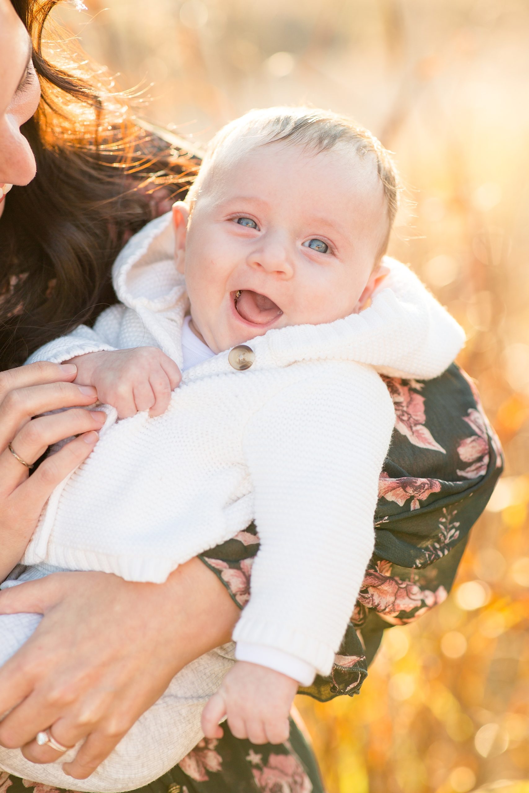baby boy laughs during Nashville family portraits