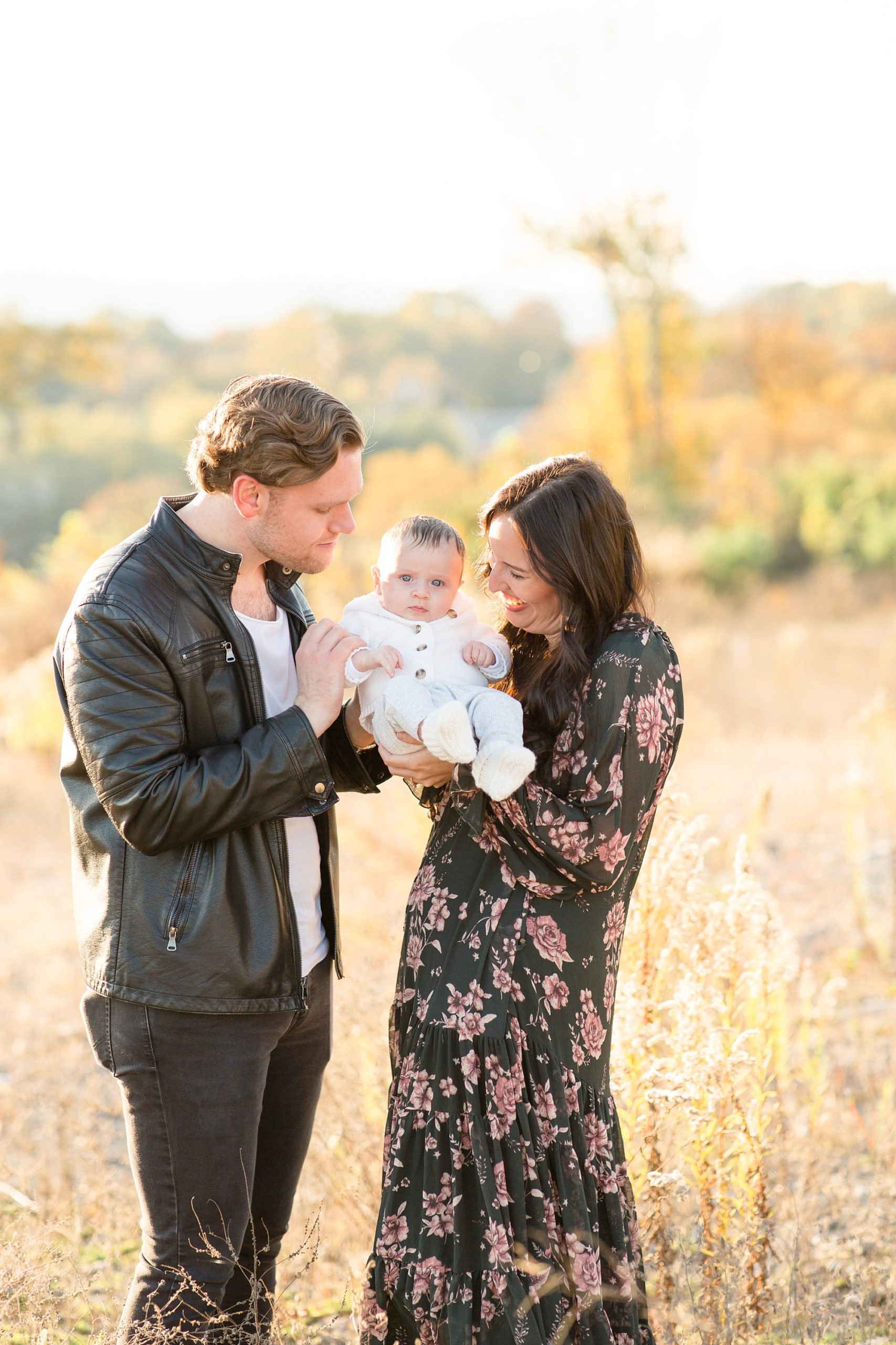 parents make baby laugh during photos in Tennessee
