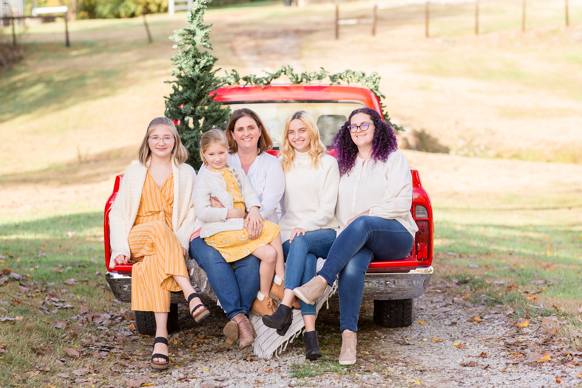 mom and daughters pose in Franklin TN during holiday minis