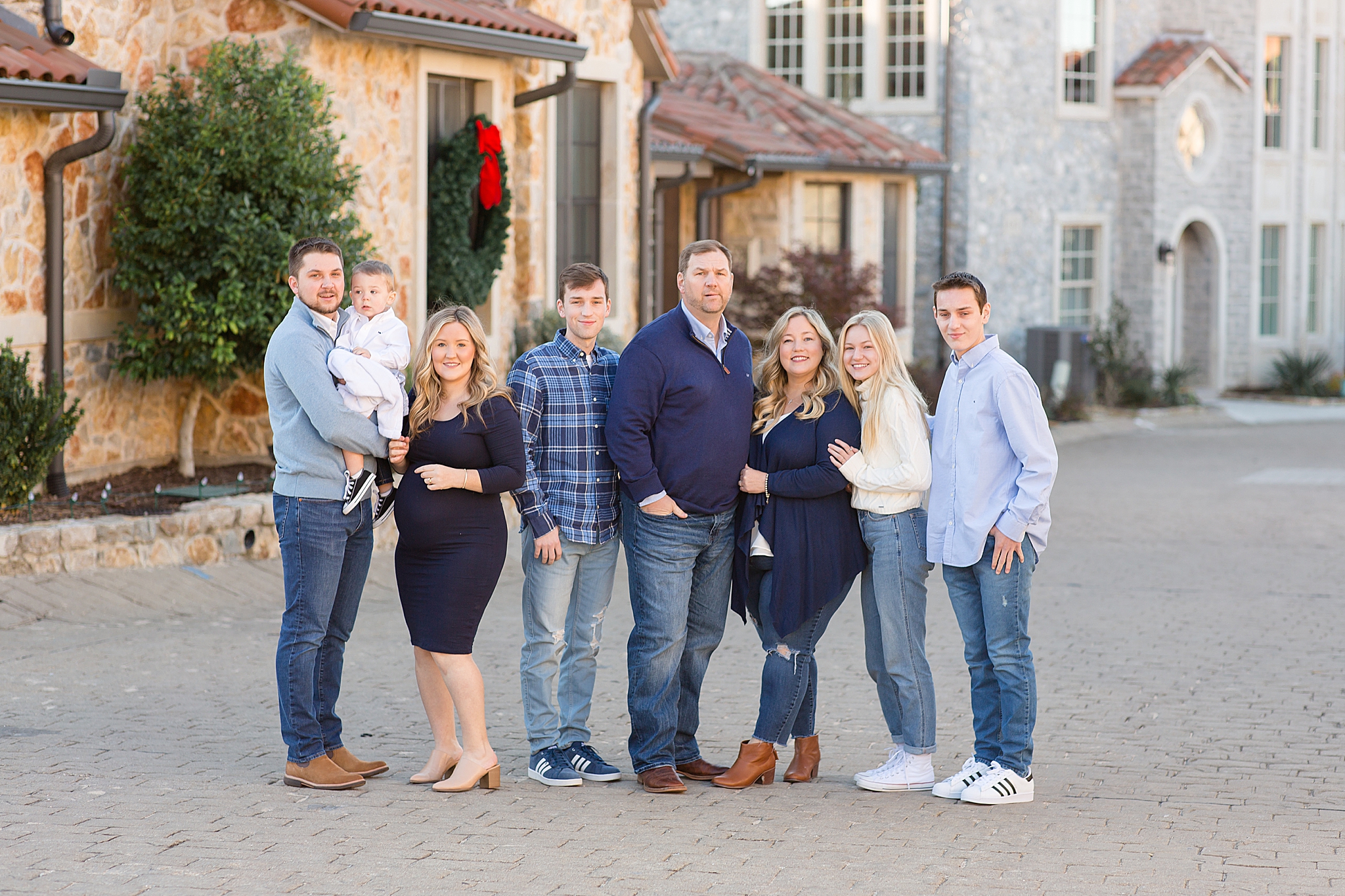 family of 8 poses during McKinney extended family session