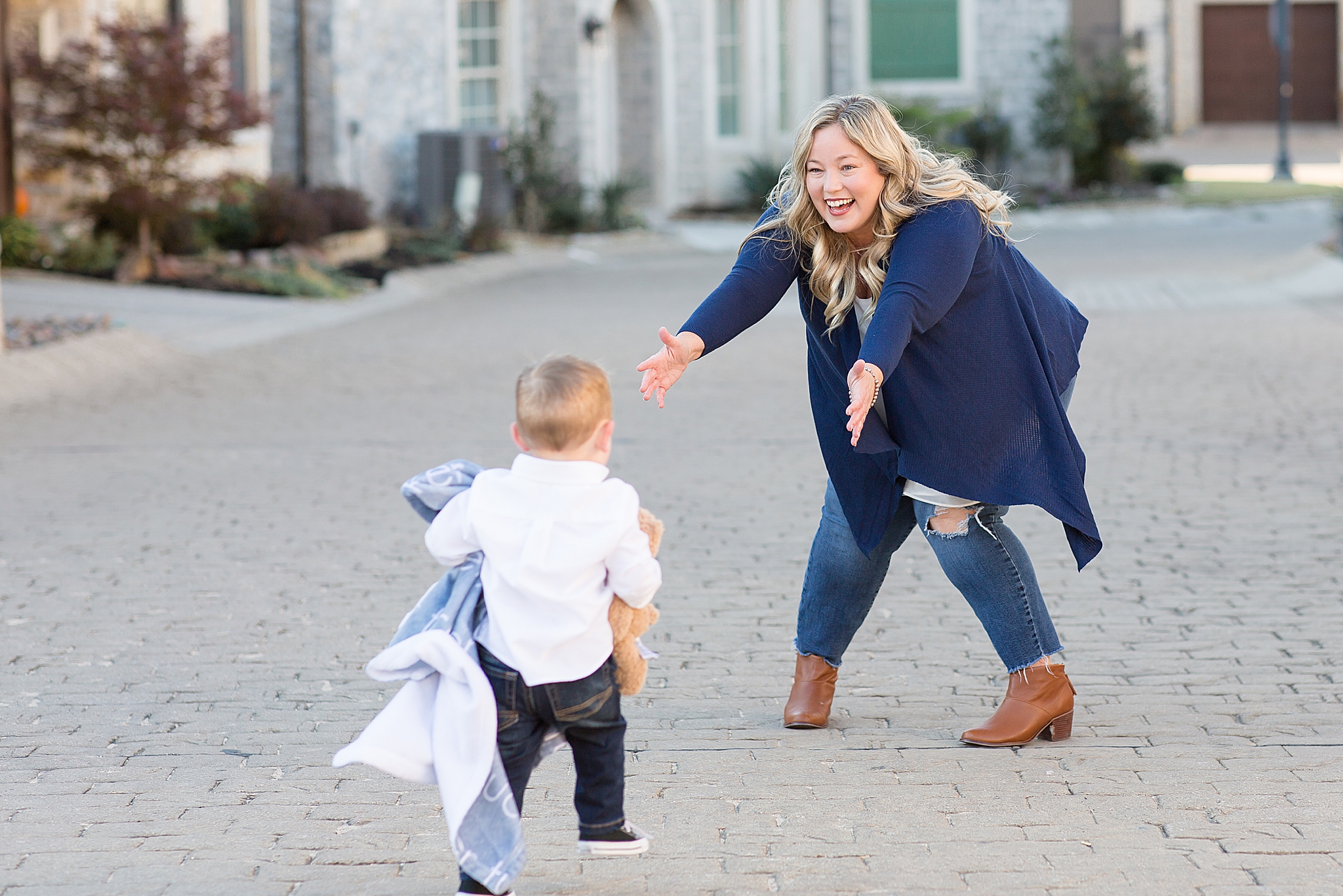 toddler runs to grandmother during Texas family photos