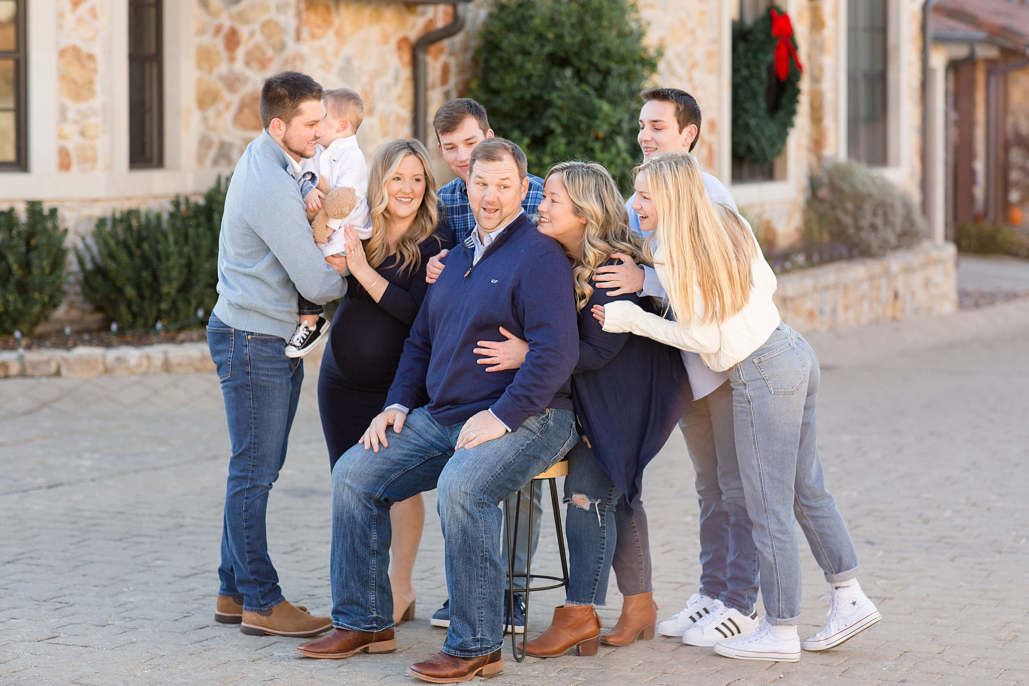 dad makes funny face during family photos in Texas