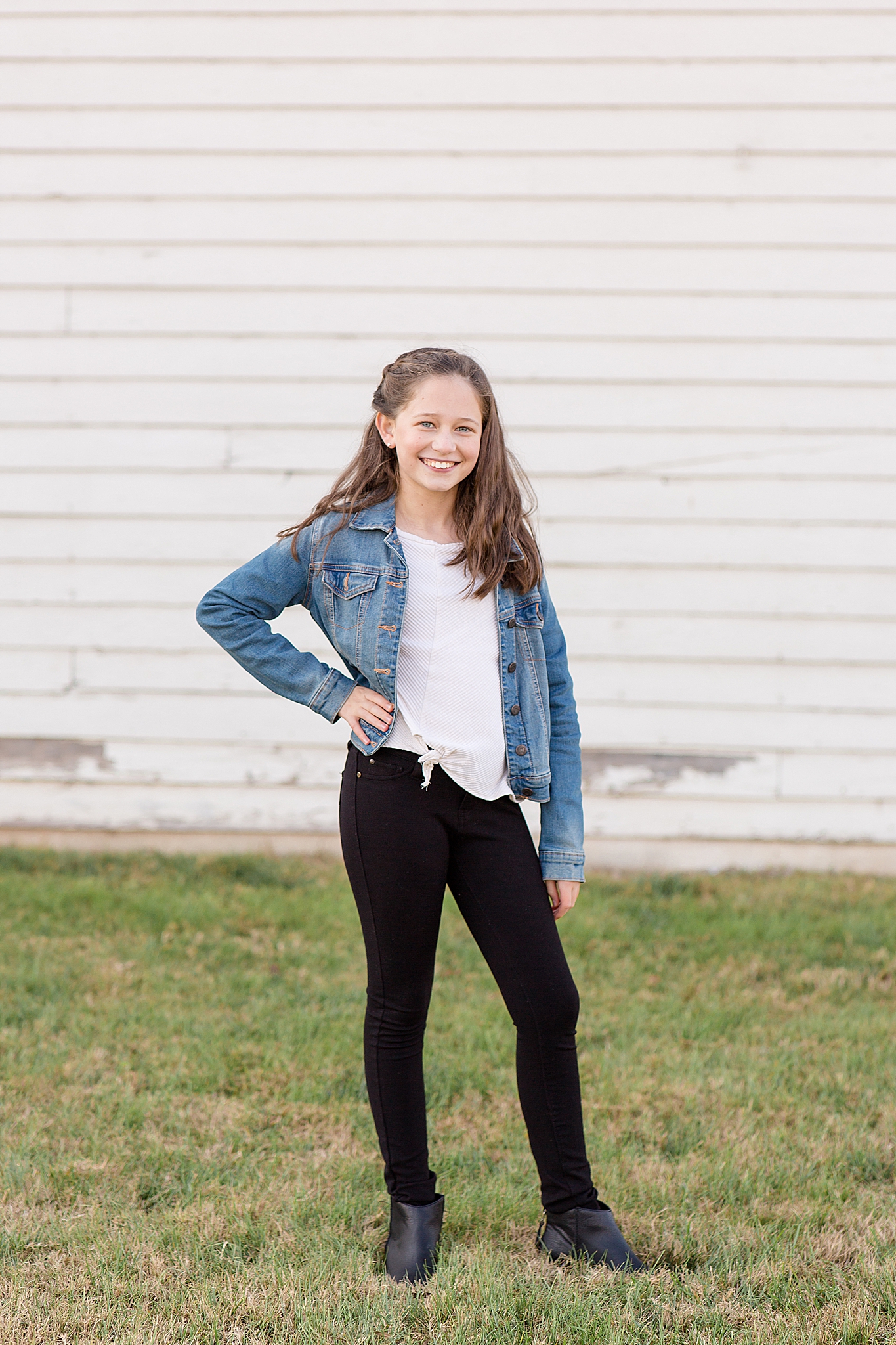 young girl poses with hand on hip during Franklin TN family photos