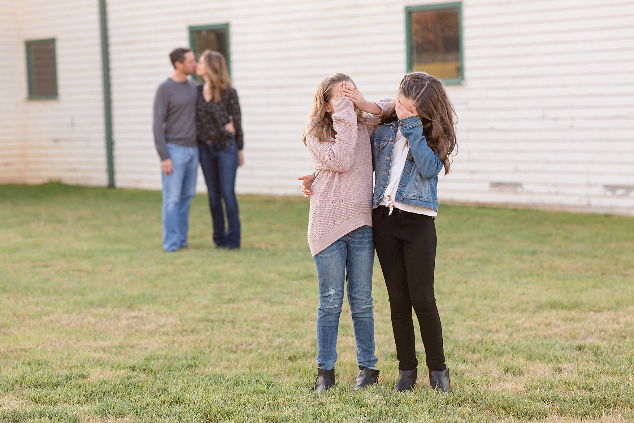 daughters cover eyes during family photos at Harlinsdale Farm