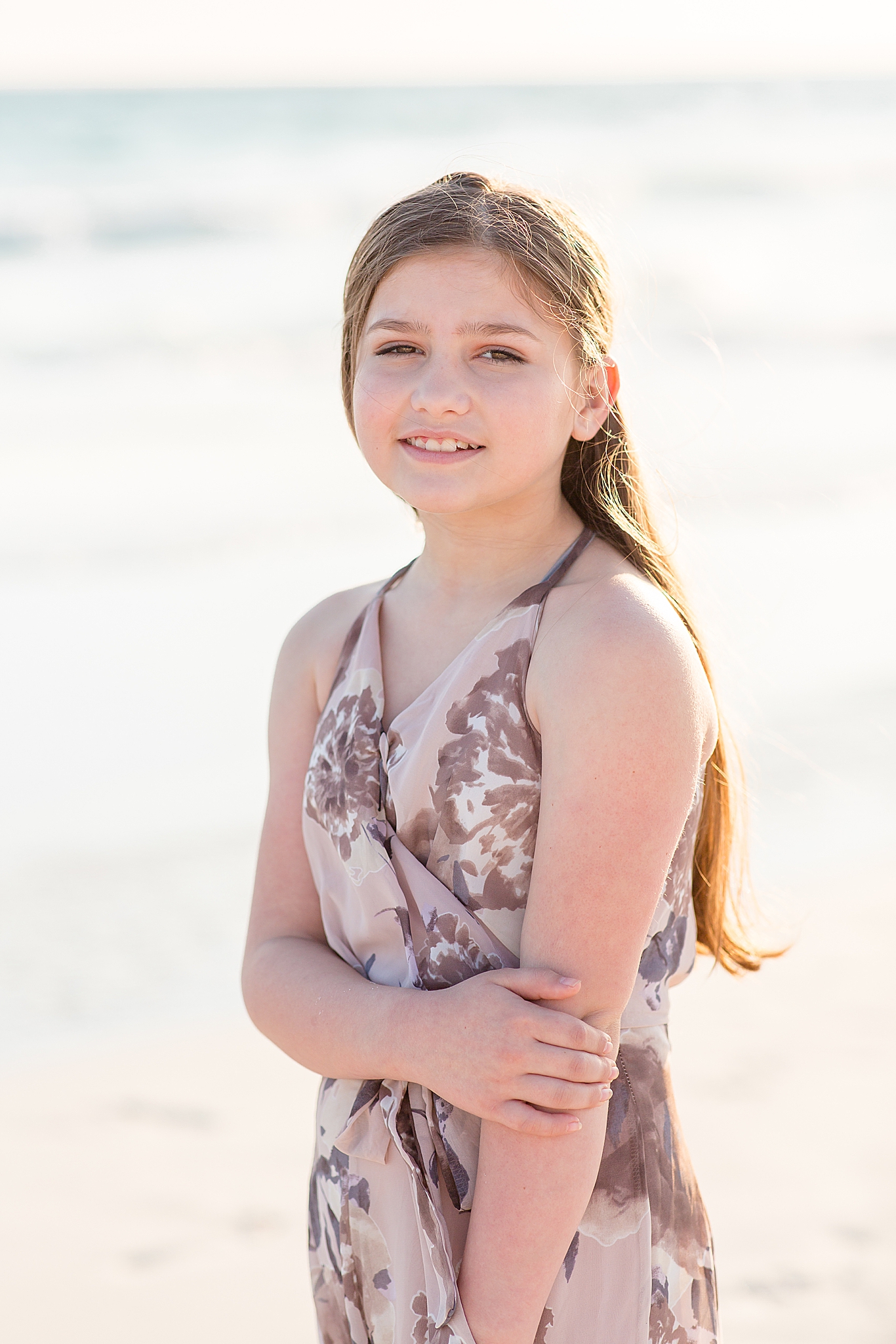 young girl smiles on beach in Florida