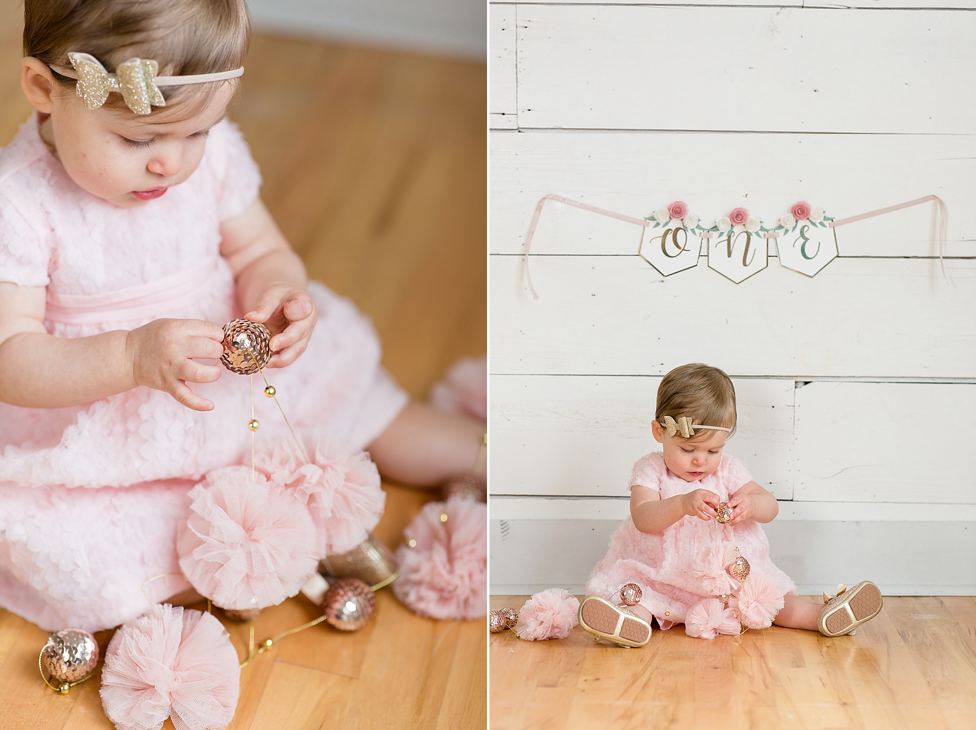 toddler in pink dress plays with pink and gold garland
