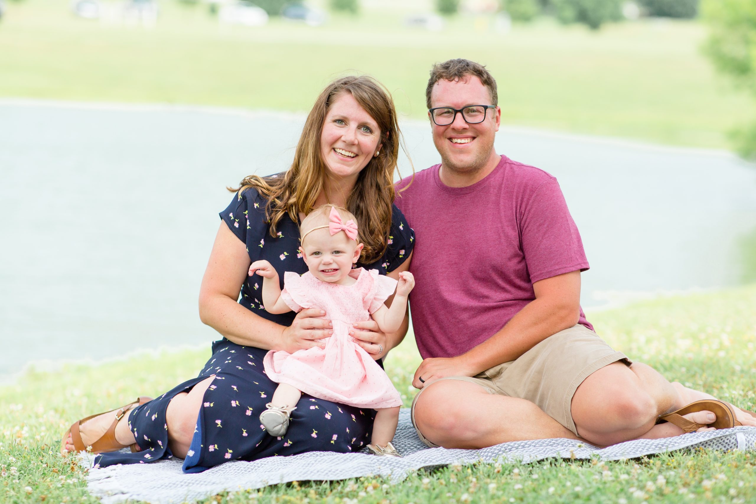 Family of 3 poses for quick shot during daughter's first birthday session at Harlinsdale Farm in Franklin, TN with Rebecca Rice Photography. Click to see more from this sweet session on the blog now! 