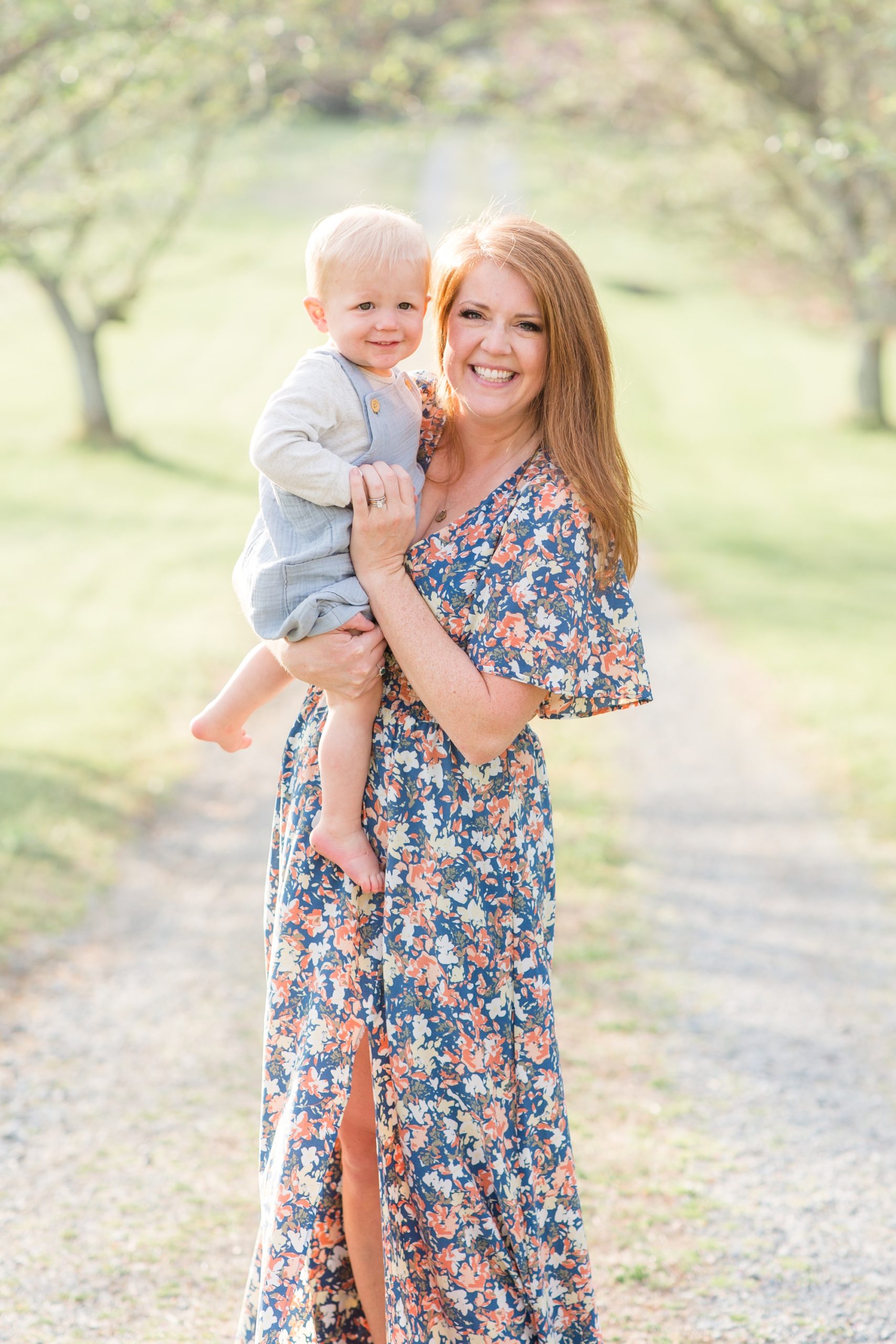 Mom poses with baby boy on gravel road in Richmond, VA with family photographer and educator, Rebecca Rice of Rebecca Rice Photography. Click to see more from this sweet session live on the blog now. 