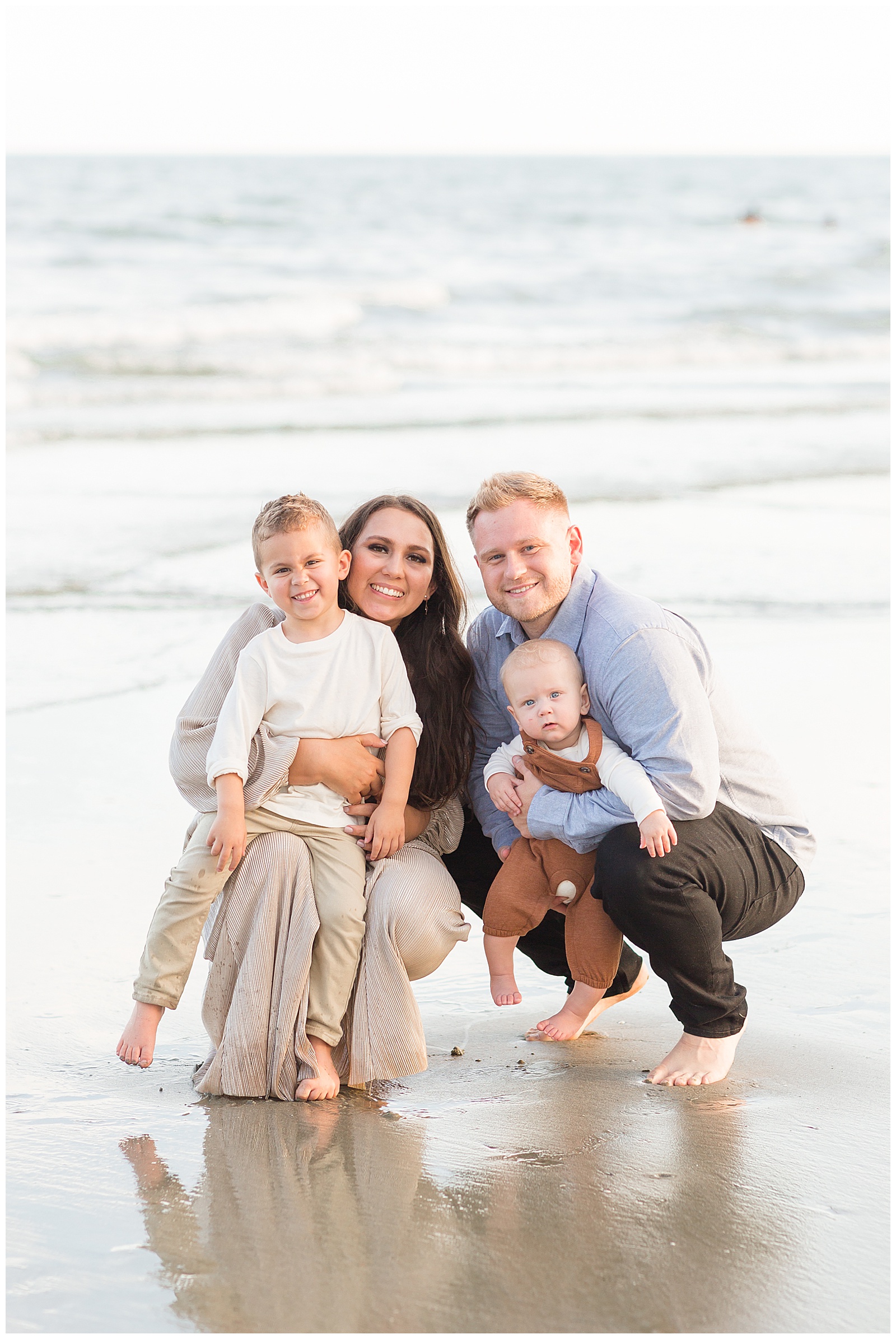 Charleston family photographer, Rebecca Rice, captures family of four on the Isle of Palms beach for her Behind the Lens membership.