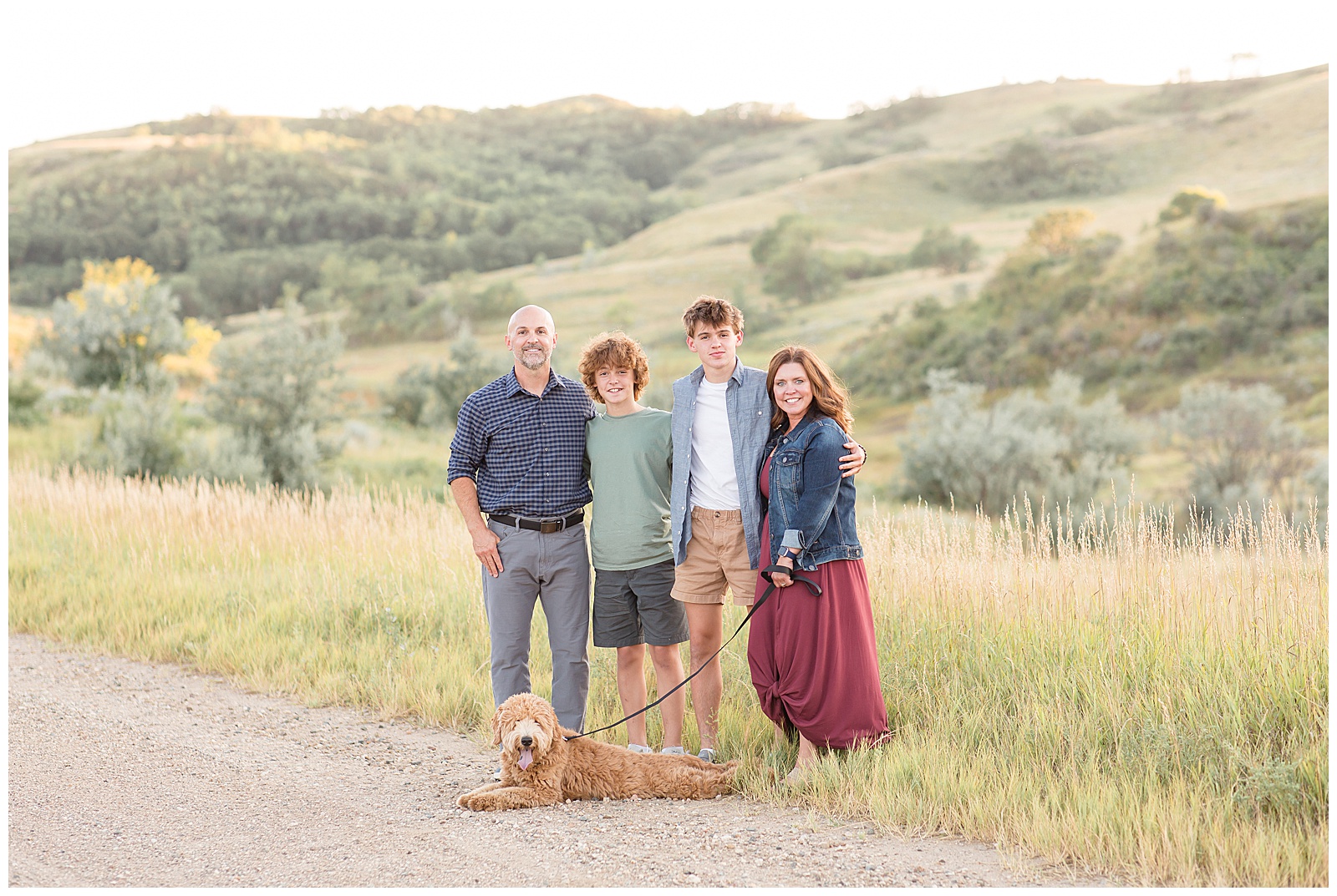 North Dakota Family Photographer photographs family of 4 and goldendoodle pup for course designed for family photographers.