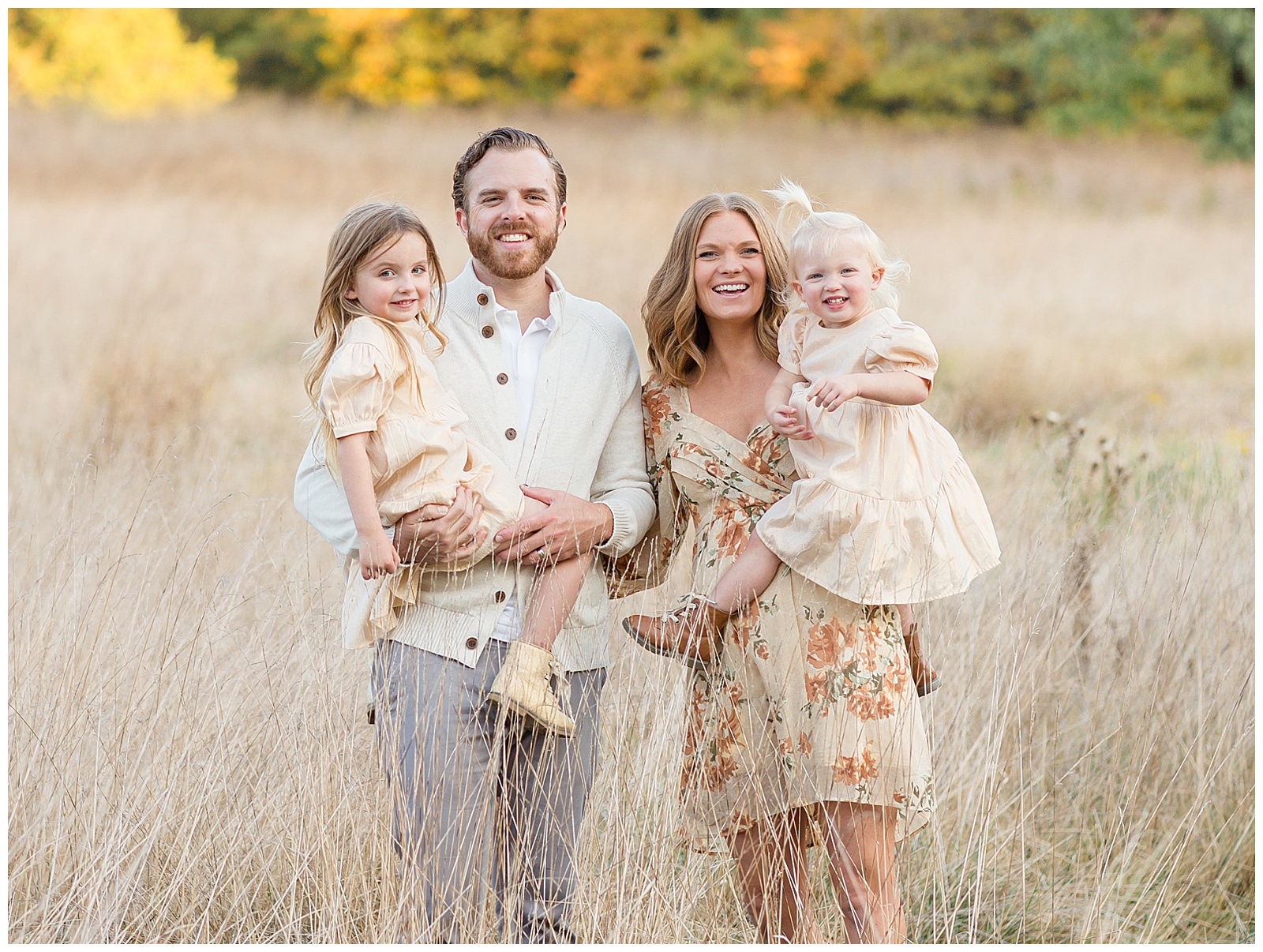 Family of 4 take family portraits in Nashville field with Rebecca Rice Photography.  Click to see more on the blog now!