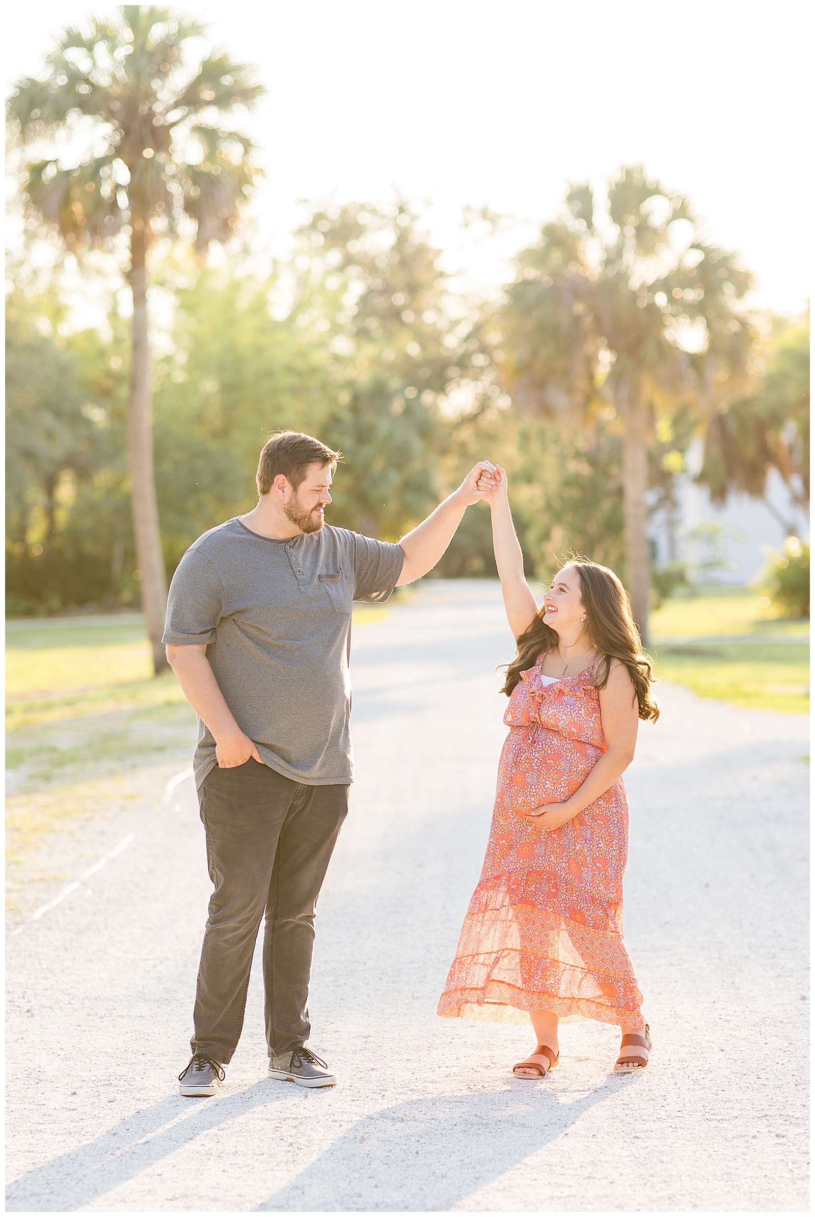 Pregnant momma and her husband stand in a neighborhood street in Florida and enjoy a dancing spin while they continue to look at each other!  This session was captured by Rebecca Rice Photography for her behind the scenes membership to see her in action as a photographer!  Click to see more of this couple on the blog today!
-rebeccaricephoto.com